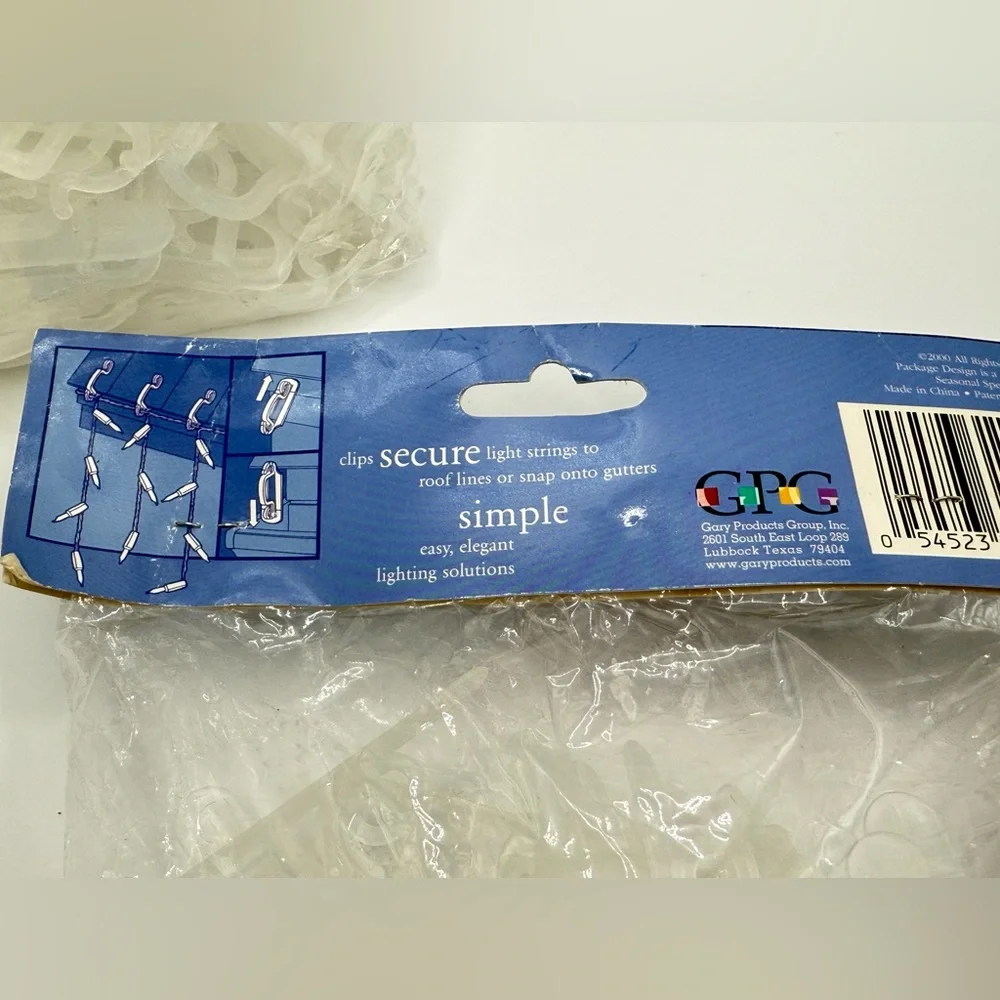 2 Lite Up &1 Santa’s Best 100 icicle light clips 300 total.Christmas light clips